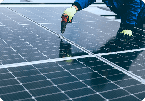 Technician working on solar panels